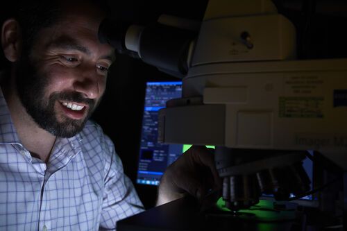 A man uses imaging equipment