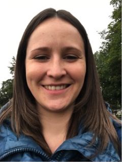 An image of Dr Jennifer Tomlinson in the woods