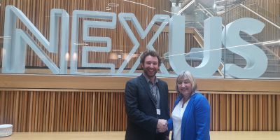 Dr James Warren and Professor Karen Birch smile at the camera