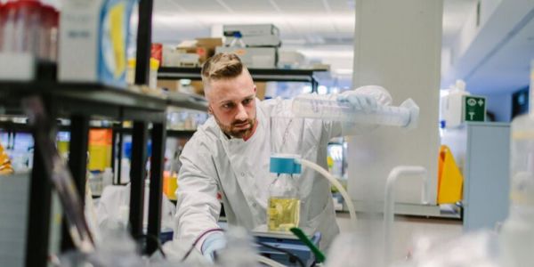 Postgraduate student conducting research in lab